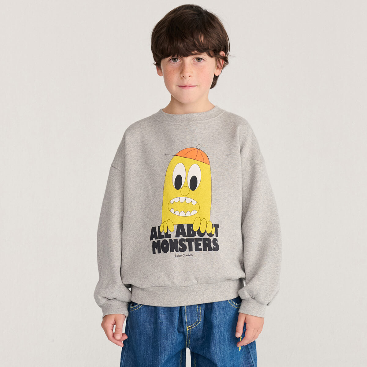 Sweat-shirt décontracté gris clair chiné en coton biologique "All About Monsters" avec poignets côtelés et imprimé graphique pour enfants de 1 à 13 ans