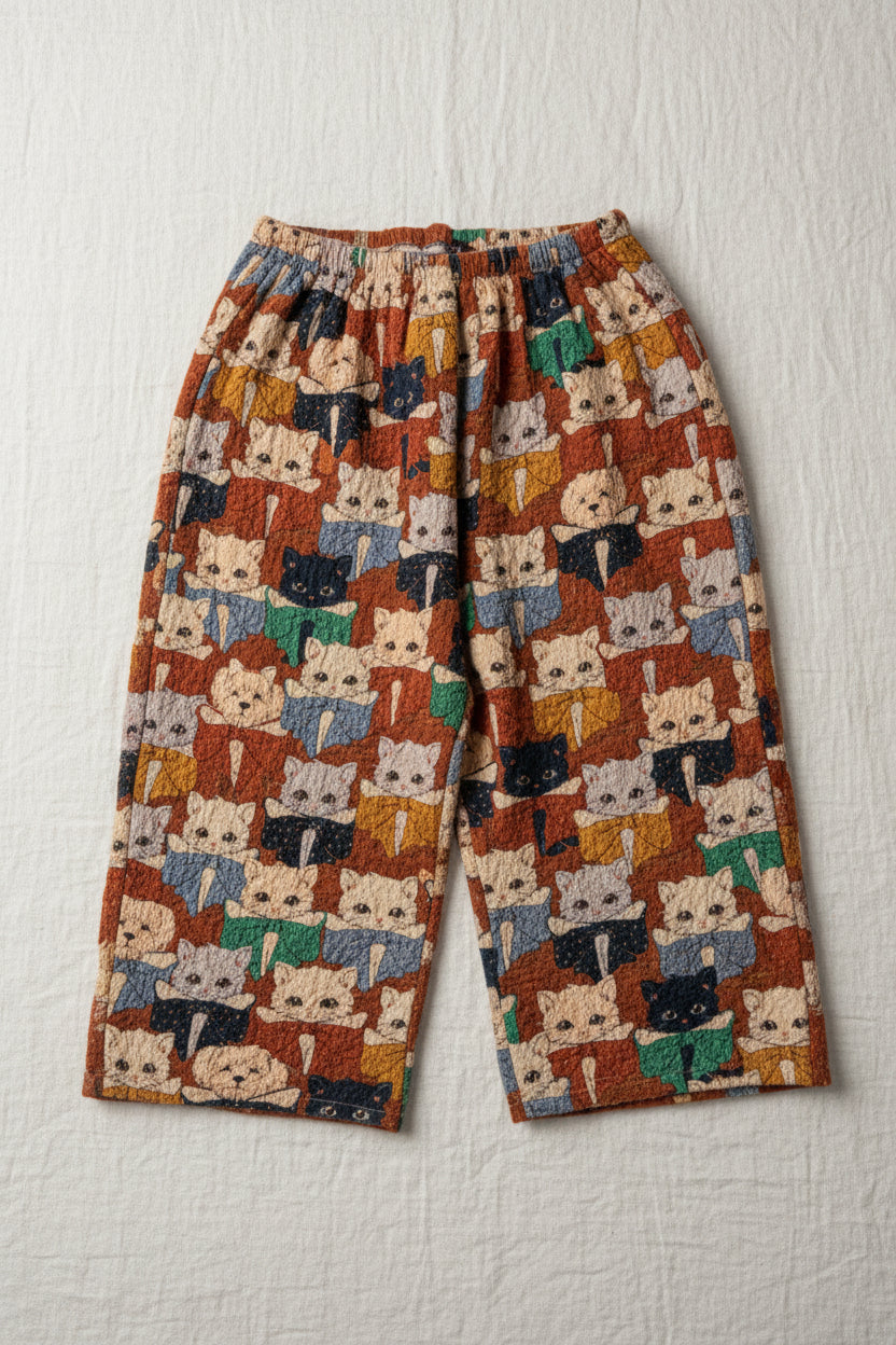 Pantalon ample en seersucker de coton biologique avec taille élastique et ourlet fendu pour enfants de 1 à 8 ans, motif chat et chien