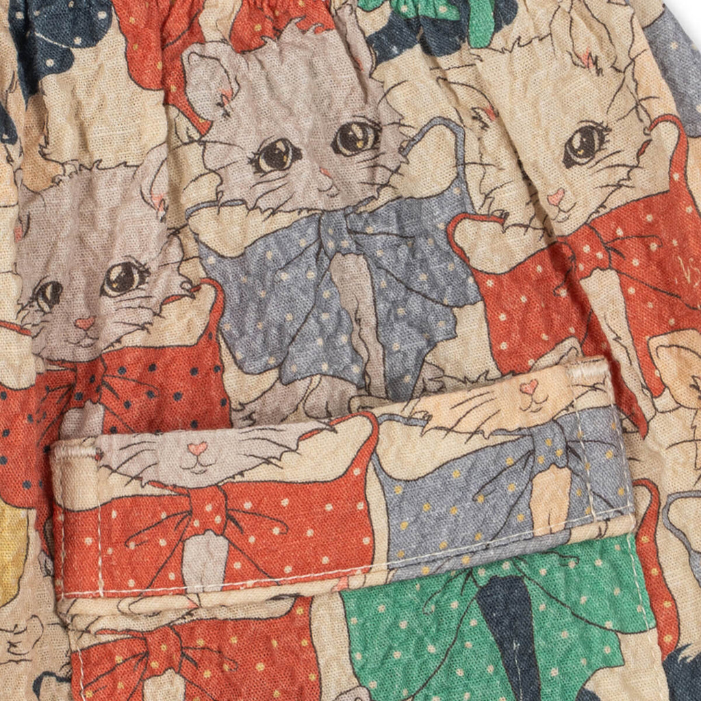 Pantalon ample en seersucker de coton biologique avec taille élastique et ourlet fendu pour enfants de 1 à 8 ans, motif chat et chien