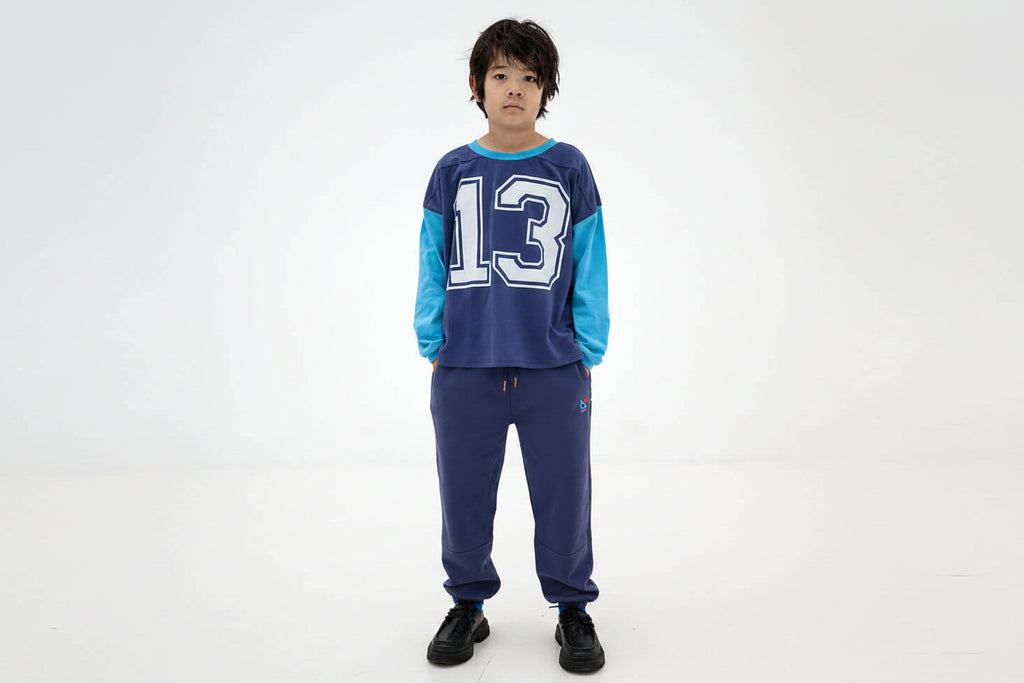 Pantalon de jogging sportif enfant en coton biologique bleu éclipse avec détails coupés-cousus et taille élastiquée, 2-14 ans