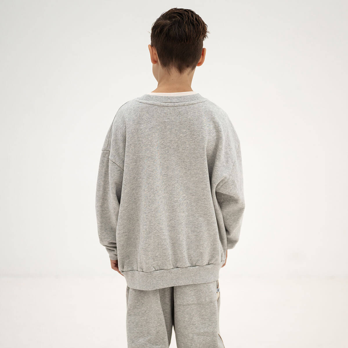 Sweat-shirt ample à logo gris clair chiné en coton biologique avec épaules tombantes et coupe décontractée pour enfants de 2 à 14 ans