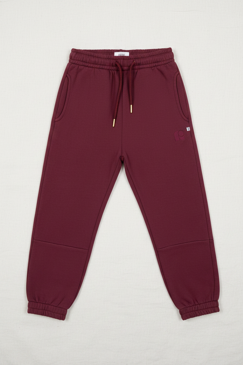 Flat lay joggers on linen background
